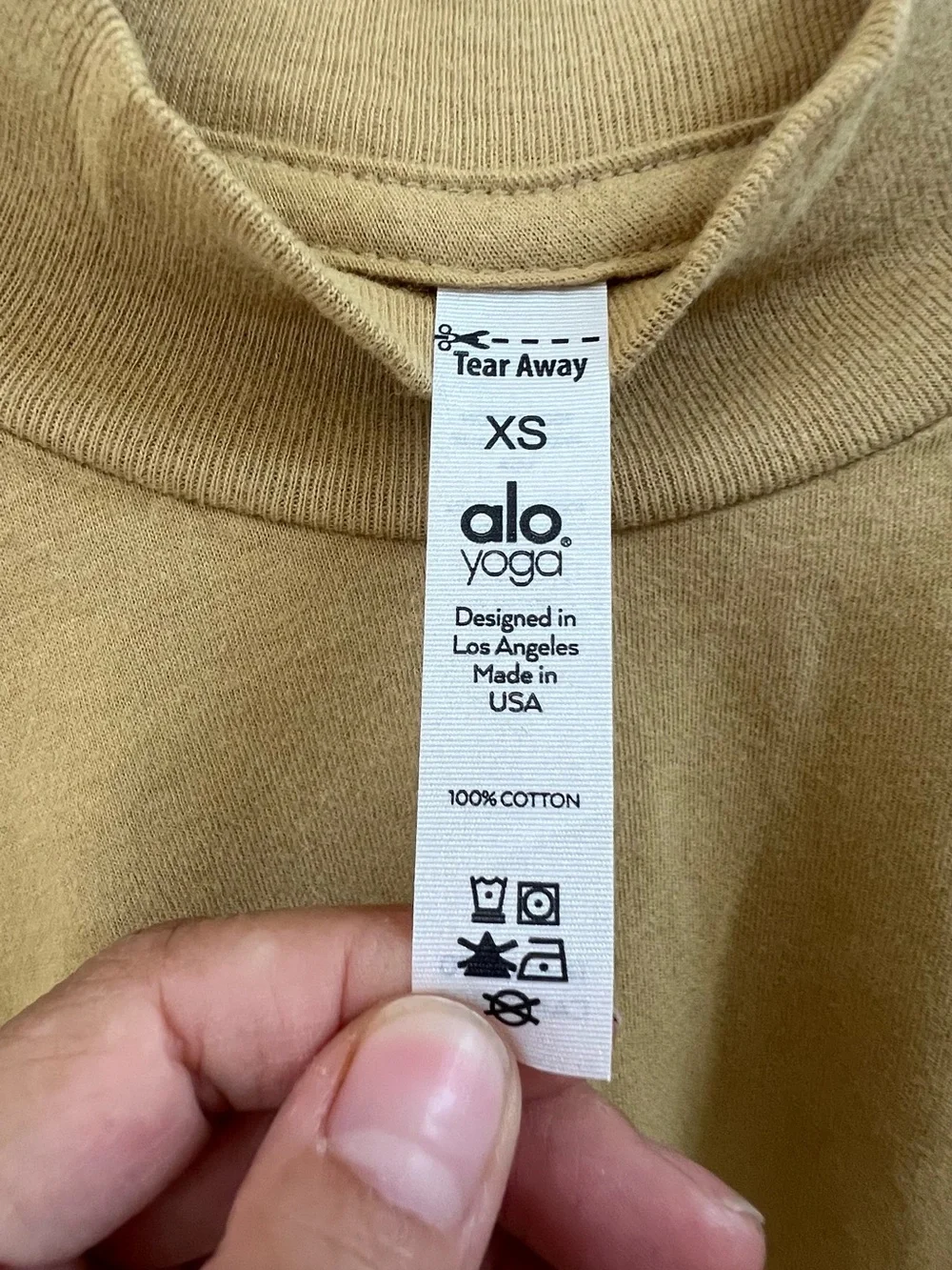 ALO Yoga Cropped Mock Neck Top in Camel Brown